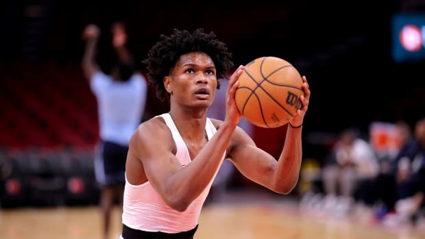 Rockets forward Amen Thompson works out prior to the game against the Memphis Grizzlies at Toyota Center.